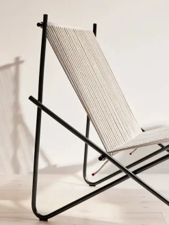 Fritz Hansen PK4 Loungestol i natur, sort stel af Poul Kjærholm> Loungestole|Lænestole